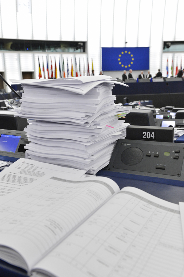 A pile of documents in the plenary Chamber